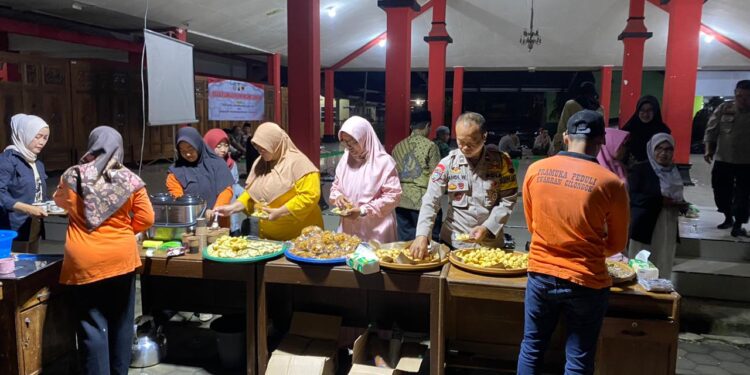 Pramuka Peduli Kwarran Cilongok Dirikan Dapur Umum pada Kegiatan Doa Bersama Lintas Sektoral